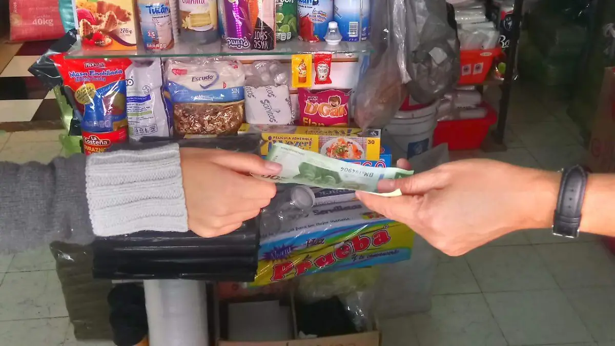 En alerta se encuentran los comercios c_ntricos por circulaci_n de billetes falsos.